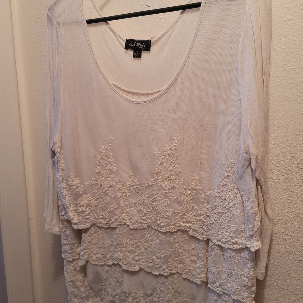 Lace ruffled shirt.